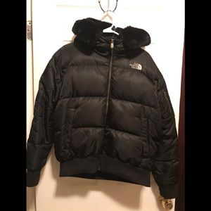 North Face black women’s down coat in a size M